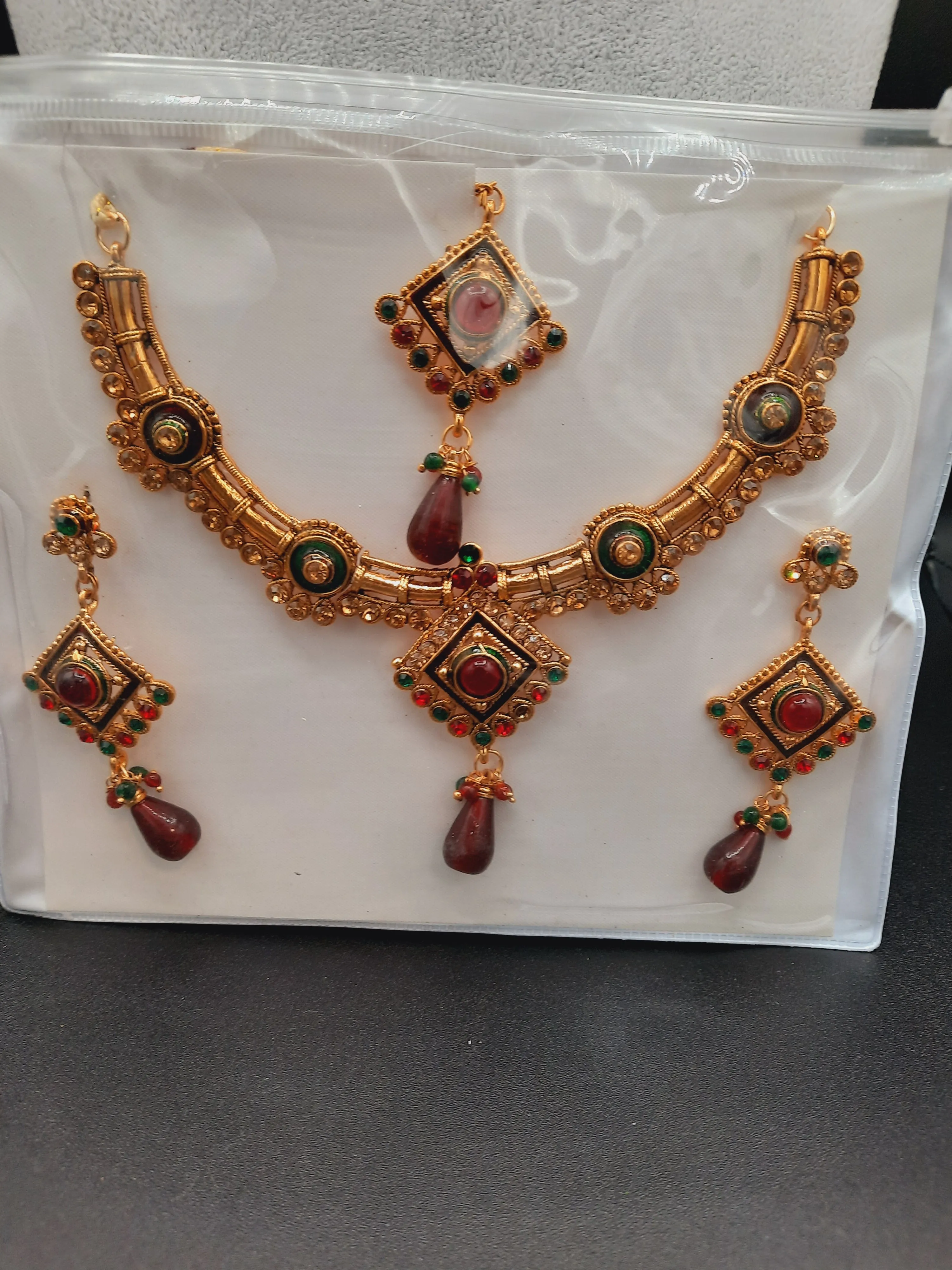 Indian Wedding party jewelry sets in golden base and meena color