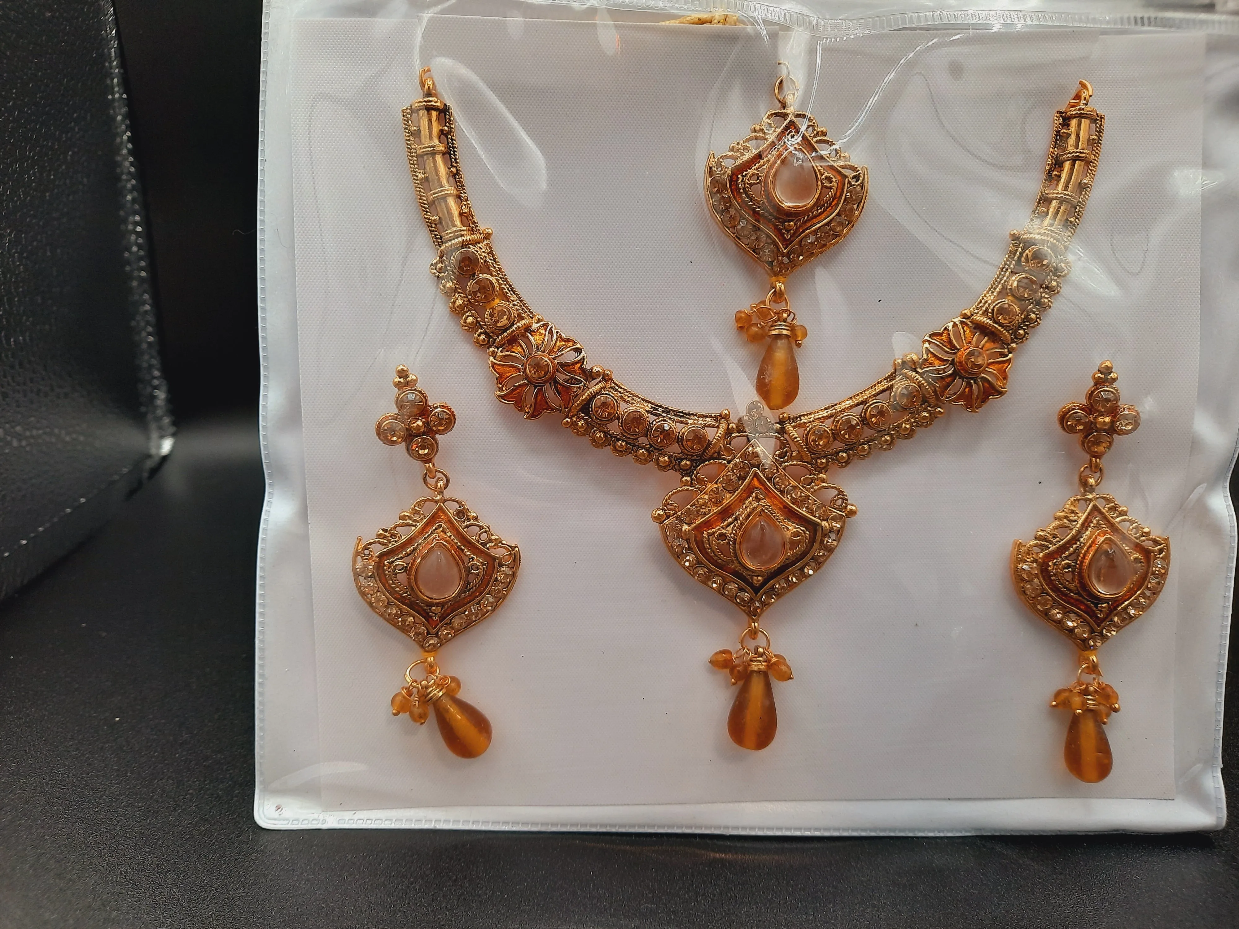 Indian Wedding party jewelry sets in golden base and meena color