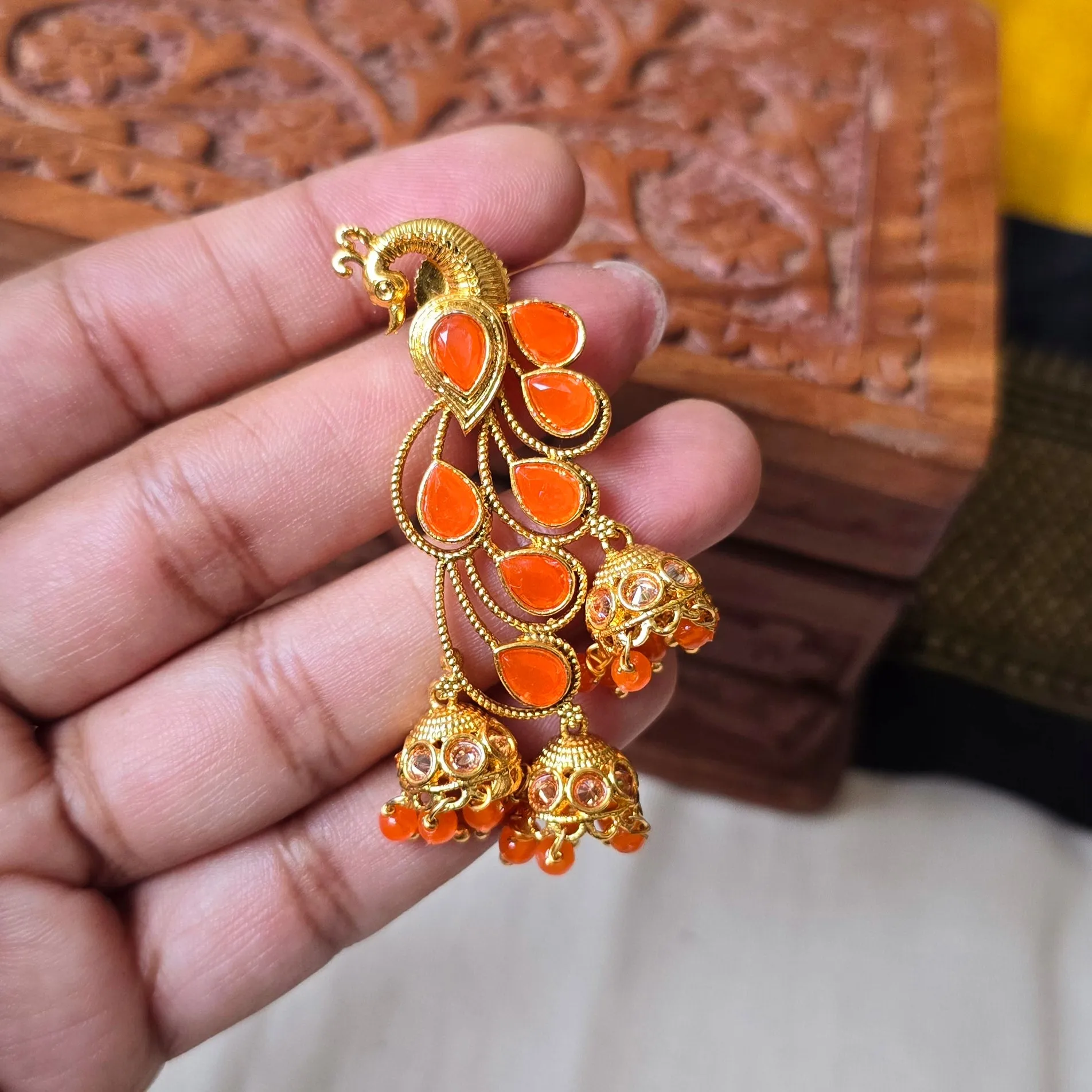 Peacock style hanging jumki earrings