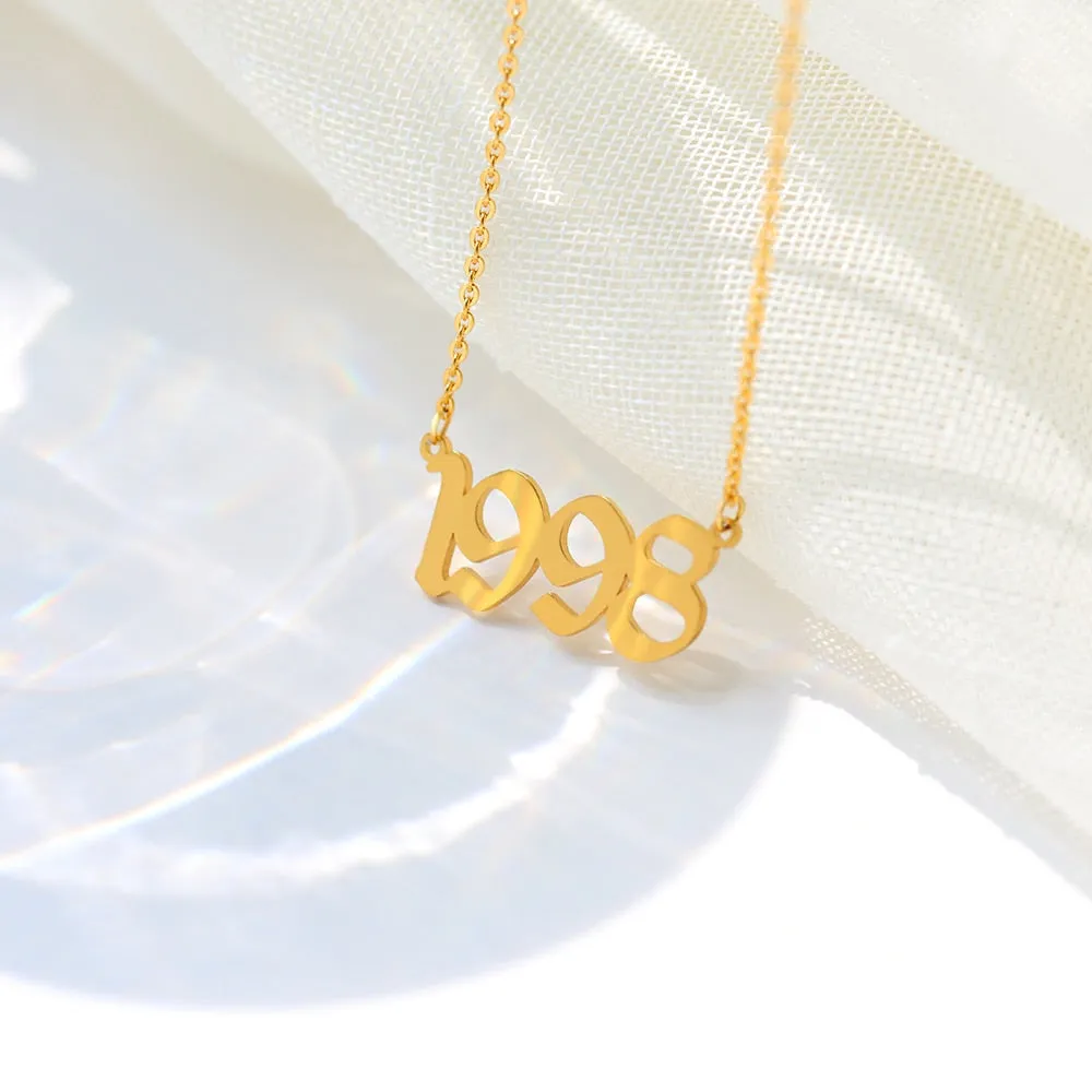 " Born In" Gold Pendant Necklace